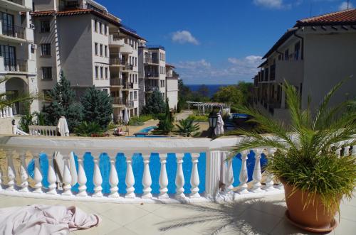 a balcony with a blue and white fence at Beautiful 1st-Line Seaview Private Appartement in The Cliff resort in Obzor