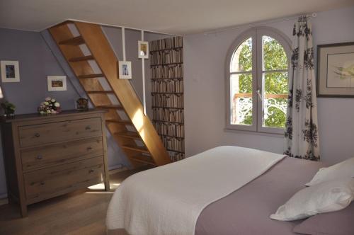 Postel nebo postele na pokoji v ubytování Le Pavillon Bellevue