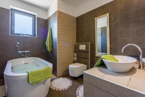 Ванна кімната в Villa Legara