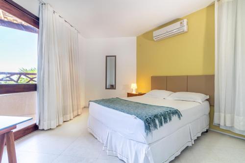 Ένα ή περισσότερα κρεβάτια σε δωμάτιο στο Eco Village Cumbuco