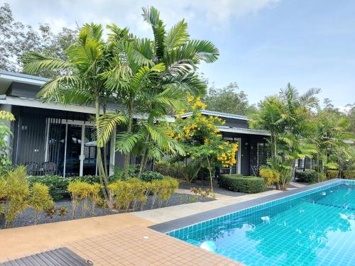 The swimming pool at or close to The Herbal Khao Lak