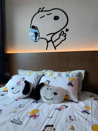 Llit o llits en una habitació de Geo38 Residence Snoopy