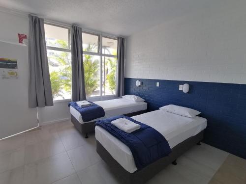 Postel nebo postele na pokoji v ubytování Hoey Moey Backpackers
