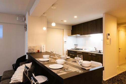 Una cocina o zona de cocina en Stay Hakata