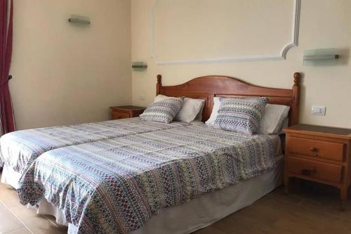 A bed or beds in a room at Plaza Charco - Top centro - Piscina Rooftop