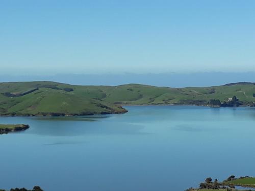 an island in the middle of a body of water at Niagara Ridge Retreat Catlins in Niagara