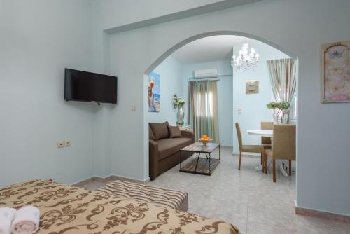 Ένα ή περισσότερα κρεβάτια σε δωμάτιο στο Spyros Apartments with Pool