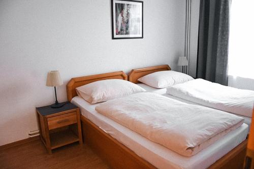 Llit o llits en una habitació de Villa Jinonice