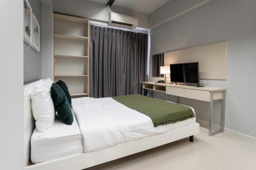 Ένα ή περισσότερα κρεβάτια σε δωμάτιο στο LKN RESIDENCE