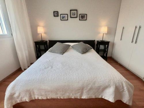 Giường trong phòng chung tại Modern, bright and spacious 3 bedrooms 2 bathrooms