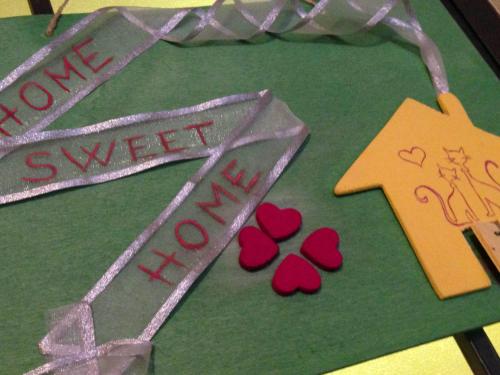 a cake with hearts and a star and the words love sweethelle at La Casa Di Cocca in Alba