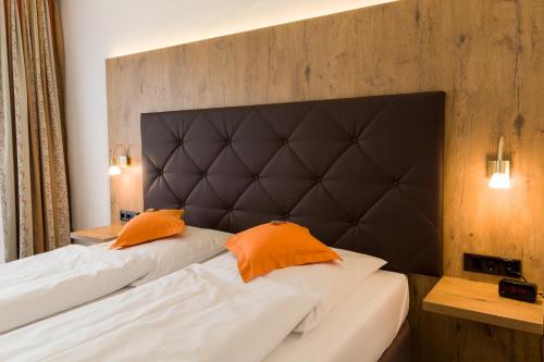 Krevet ili kreveti u jedinici u objektu Stadthotel Berggeist