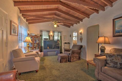 a living room with a couch and chairs and a tv at Avalon Escape Everything Within Walking Distance! in Avalon