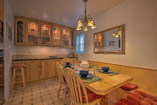 a kitchen with a wooden table and a dining room at Avalon Escape Everything Within Walking Distance! in Avalon