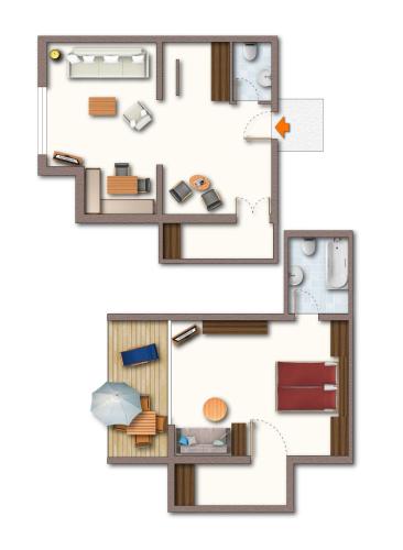 a floor plan of a house with furniture at Ferienwohnungen Bäckenhaus in Stumm