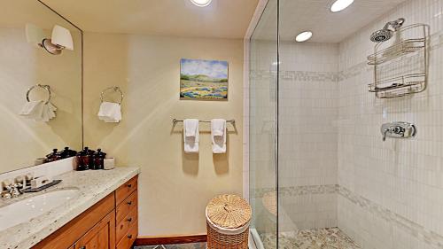 a bathroom with a glass shower and a sink at Timberline Condominiums 2 Bedroom Premier Unit C1D in Snowmass Village