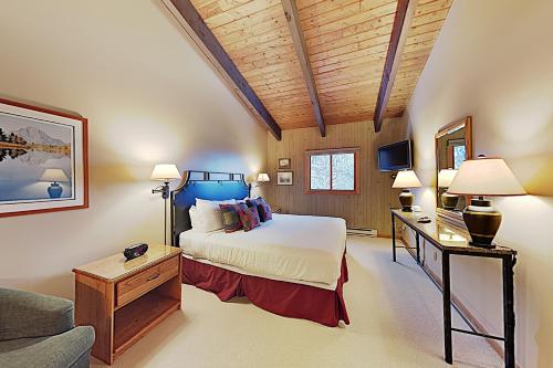 a bedroom with a bed and a couch at Timberline Condominiums 3 Bedroom Standard Unit D3A in Snowmass Village