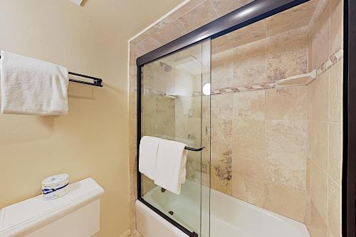 a bathroom with a glass shower and a toilet at Timberline Condominiums 3 Bedroom plus loft Deluxe Unit D3E in Snowmass Village