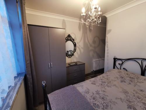 A bed or beds in a room at Palaz 2 - 2 Bedroom Flat