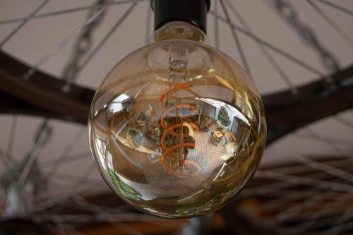 a glass ball with an orange object in it at Hostal Yakumama in Cuenca