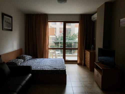 Ένα ή περισσότερα κρεβάτια σε δωμάτιο στο Vadim Apartments in Panorama Beach Vigo Nessebar