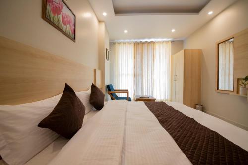 Cama o camas de una habitación en Punyah Residency Rishikesh