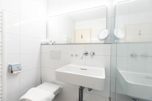 A bathroom at Ferienwohnung Heidi