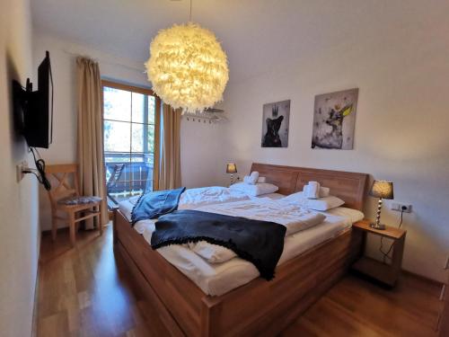 Un pat sau paturi într-o cameră la Chalet Marille Gastein