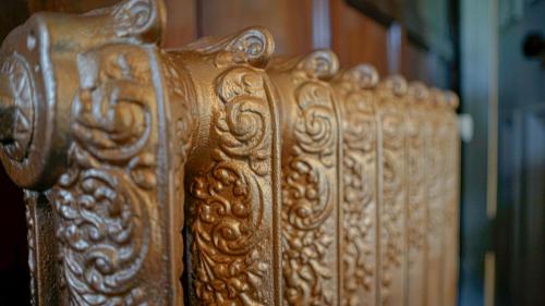 a close up of a group of wooden furniture at Banoge House in Donaghcloney