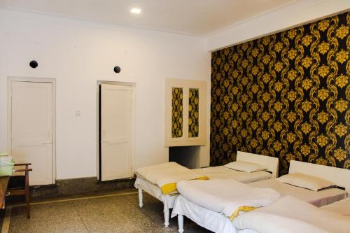 Hotel Anand Palaceにあるベッド