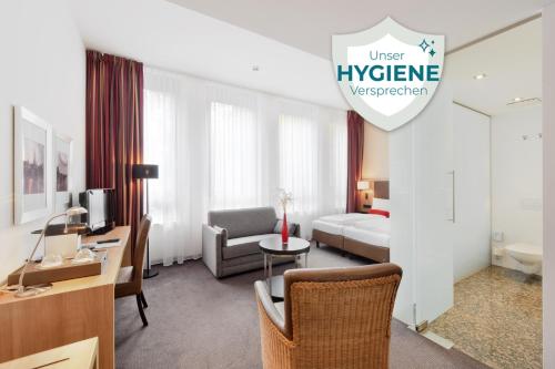 Postel nebo postele na pokoji v ubytování ACHAT Hotel München Süd