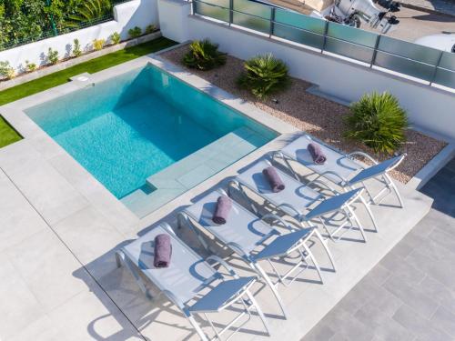 Bazén v ubytovaní Holiday Home Ca na Cati by Interhome alebo v jeho blízkosti