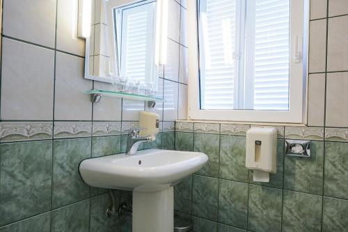 Ein Badezimmer in der Unterkunft Hotel Belvedere