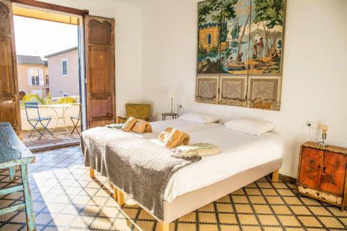 Giường trong phòng chung tại Villa Son Mas