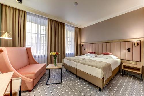 Voodi või voodid majutusasutuse Arbat Nord Hotel toas