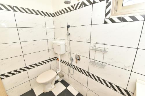 Ein Badezimmer in der Unterkunft Corinne Hostel