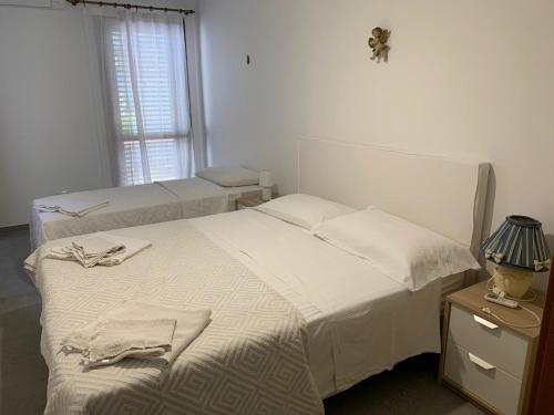 Llit o llits en una habitació de Villa Sabri