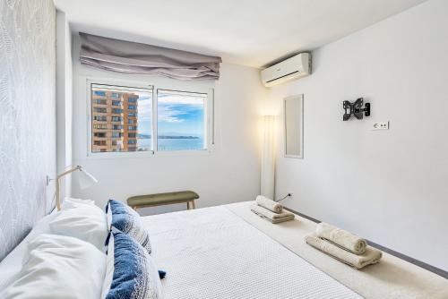 Postel nebo postele na pokoji v ubytování Sur Suites Perla 6