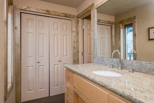 a bathroom with a sink and a mirror at Prospector 134 in Ketchum