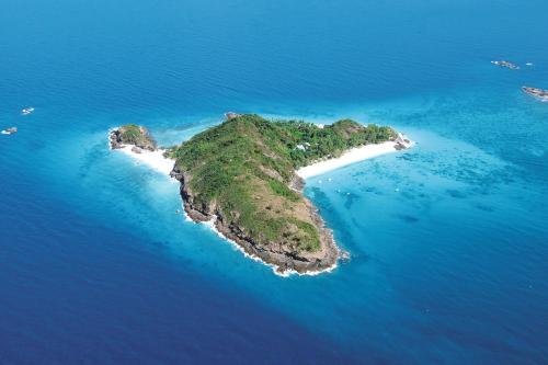 an island in the middle of the ocean at Constance Tsarabanjina - All Inclusive in Nosy Mitsio