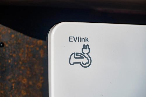 a laptop computer with a sign with a peace sign on it at Le jardin des 4 saisons in Le Mans