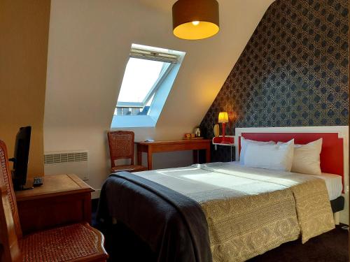 Кровать или кровати в номере Hotel Mondial