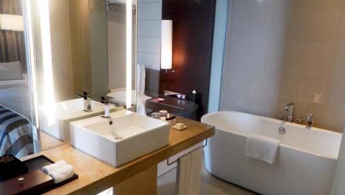 A bathroom at Ramada Plaza by Wyndham Suwon