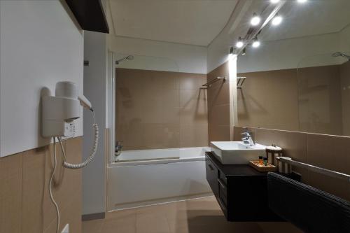 Vonios kambarys apgyvendinimo įstaigoje Castle in Blue Apartments-Sea View