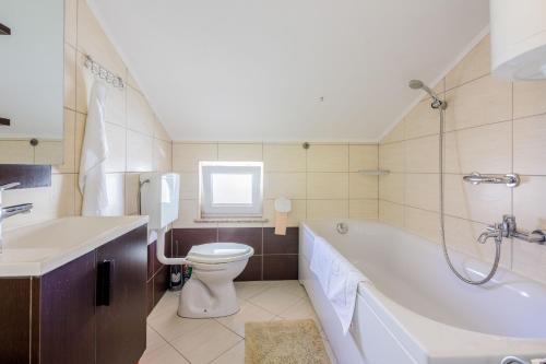 Kúpeľňa v ubytovaní Apartments Marissimo