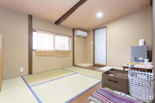 Een bed of bedden in een kamer bij Maokong NEKOSORA - Vacation STAY 06931v