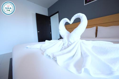 Postel nebo postele na pokoji v ubytování Lee Hotel