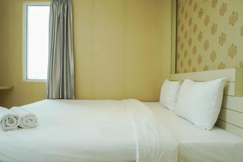 Strategic 1BR The Boulevard Apartment with Luxurious Design By Travelio