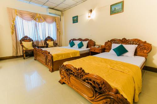 Postel nebo postele na pokoji v ubytování Star Hotel