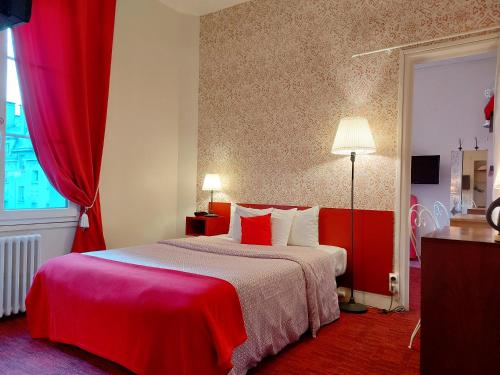 Кровать или кровати в номере Hotel Mondial